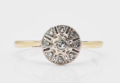 Lot 531 - An 18ct yellow gold tiny diamond set circular...
