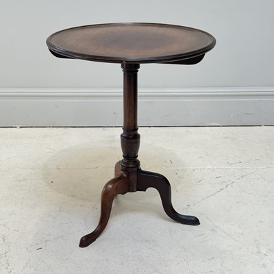Lot 1182 - A 19th century mahogany tripod table, with...