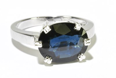 Lot 1122 - An 18ct white gold and sapphire solitaire ring...