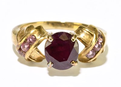 Lot 1188 - A 9ct gold ruby dress ring, aize M 1/2, approx....