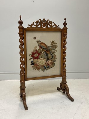 Lot 1096 - A mahogany Victorian fire screen with tapestry...