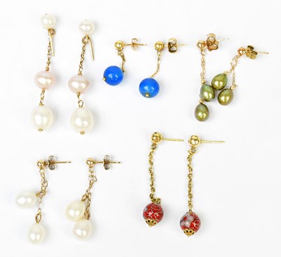 Lot 1384 - Five pairs of yellow metal chain drop earrings,...
