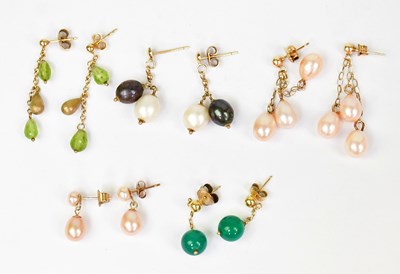 Lot 1385 - Four pairs of yellow metal chain drop earrings,...
