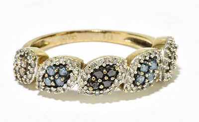 Lot 1229 - A 9ct yellow gold diamond and sapphire ring,...