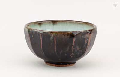 Lot 443 - MIKE DODD (born 1943); a faceted stoneware...