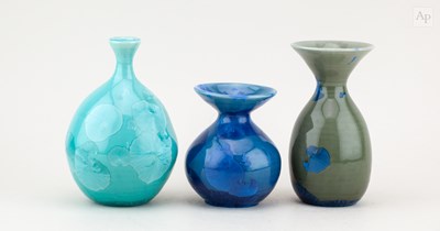 Lot 382 - LIZ ANSPOKS; a porcelain bottle covered in...