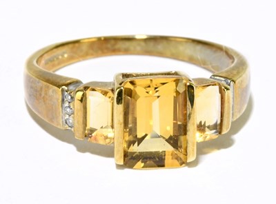 Lot 1232 - A 9ct yellow gold citrine stepped ring, size N,...