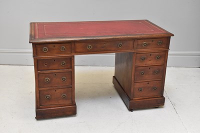 Lot 1198 - A Victorian mahogany nine drawer pedestal desk,...