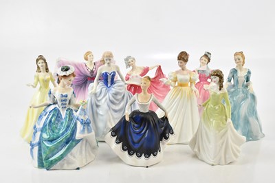 Lot 2448 - ROYAL DOULTON; a collection of ten figures...