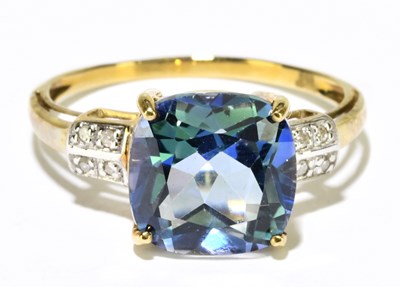 Lot 1224 - A 9ct yellow gold mystic topaz and diamond set...