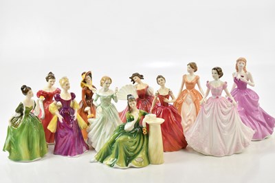 Lot 2451 - ROYAL DOULTON; a collection of eleven Royal...