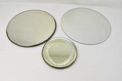 Lot 205 - Three different sized mirrored glass stands,...