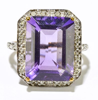 Lot 1180 - A 9ct yellow gold ring set with large emerald...
