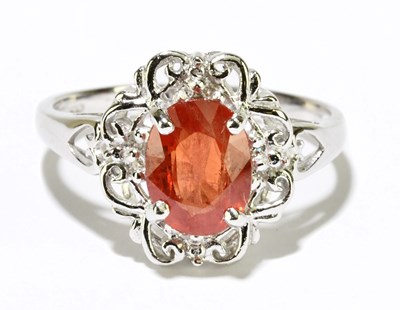 Lot 1088 - An 18ct yellow gold diamond cluster ring with...
