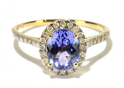 Lot 1218 - A 9ct yellow gold tanzanite and diamond ring,...