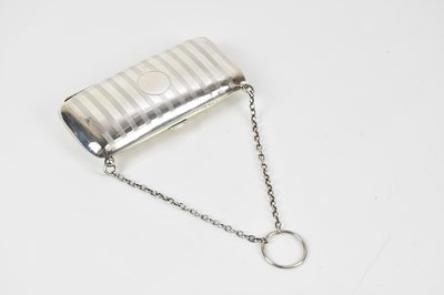 Lot 2114 - A George V hallmarked silver purse, Birmingham...