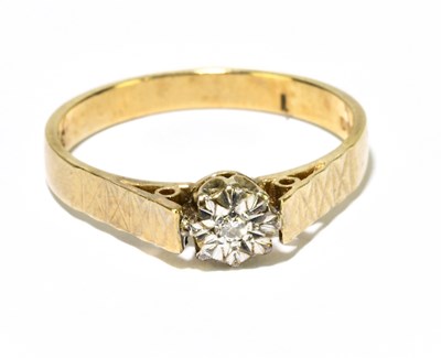 Lot 1216 - A 9ct yellow gold and illusion set diamond...