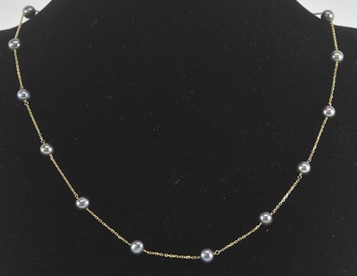 Lot 1388 - A 14ct yellow gold cultured pearl necklace,...