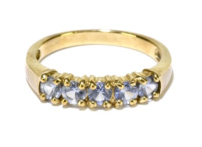 Lot 1217 - A 9ct yellow gold five stone dress ring, size...