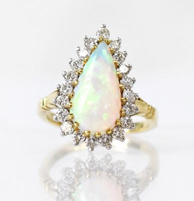 Lot 822 - A yellow metal ring set with a teardrop-shaped...