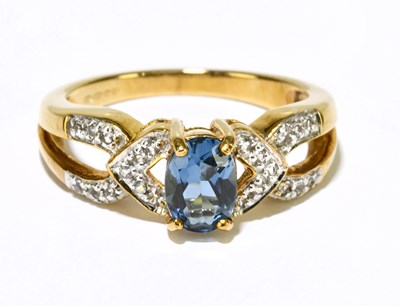 Lot 1208 - A 9ct yellow gold topaz dress ring, size N,...