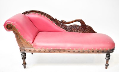 Lot 9 - A children's chaise longue with carved swan...