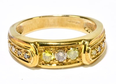 Lot 1181 - A 9ct yellow gold diamond and peridot ring,...