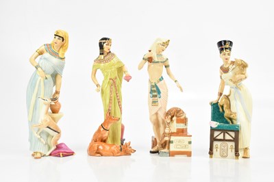 Lot 2411 - ROYAL DOULTON; a collection of four figures...