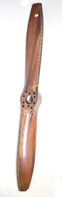 Lot 705 - A wooden propeller blade with metal edging,...