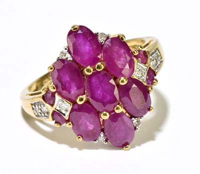 Lot 1166 - A large 9ct yellow gold dress ring, size P,...