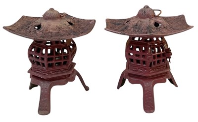 Lot 107 - A pair of vintage red painted cast iron pagoda...