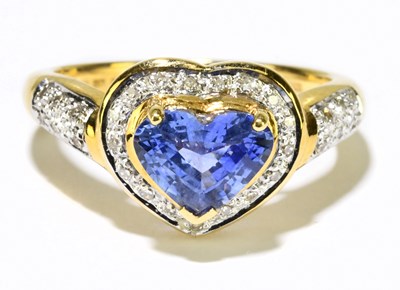 Lot 1156 - A 9ct yellow gold heart shaped diamond set...