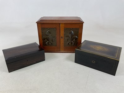 Lot 40 - An oak work box and two mahogany examples; 26...
