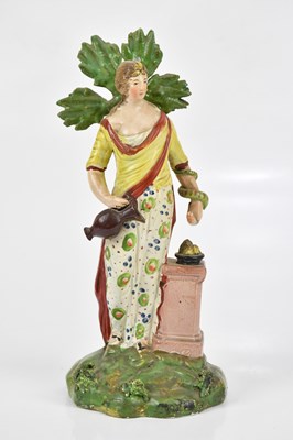 Lot 1617 - An 18th century pearlware figure of Hygeia,...