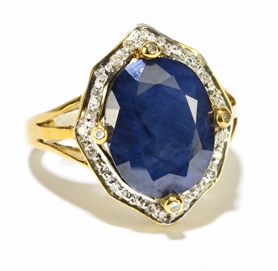 Lot 1168 - A large 9ct yellow gold sapphire and diamond...