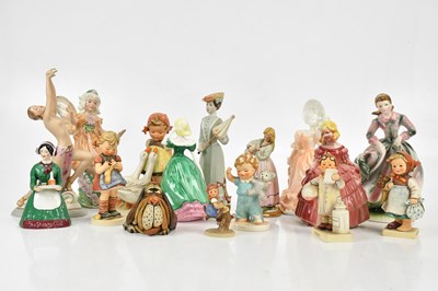 Lot 1599 - A collection of ceramic figures including...