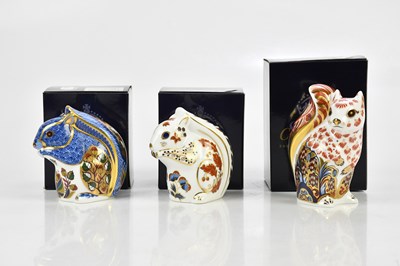 Lot 2459 - ROYAL CROWN DERBY; a group of three...