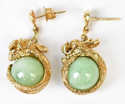 Lot 873 - A pair of 9ct yellow gold earrings in the form...