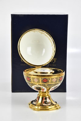 Lot 2540 - ROYAL CROWN DERBY; a Millennium Globe Clock,...