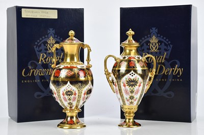 Lot 2542 - ROYAL CROWN DERBY; two vases comprising a...