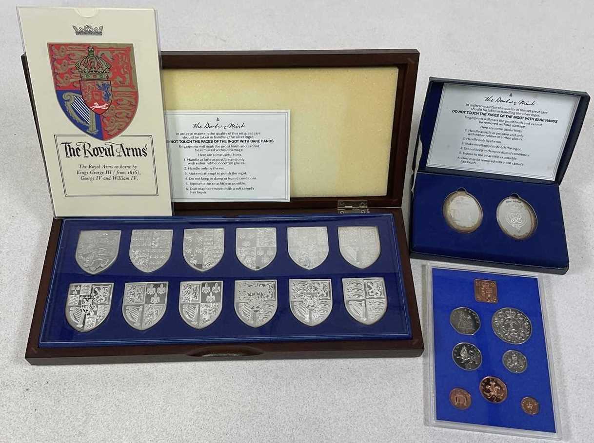 Lot 562 - DANBURY MINT; a cased set of twelve silver...