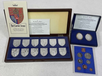 Lot 562 - DANBURY MINT; a cased set of twelve silver...