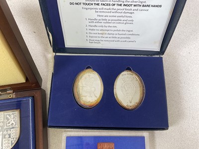 Lot 562 - DANBURY MINT; a cased set of twelve silver...