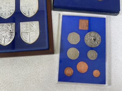 Lot 562 - DANBURY MINT; a cased set of twelve silver...