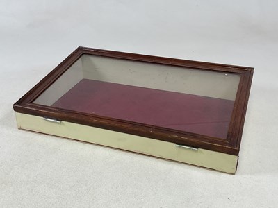 Lot 51 - A glazed display cabinet, with sloped top and...