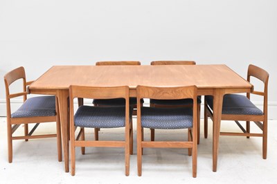 Lot 1002 - A mid century teak extending dining table,...