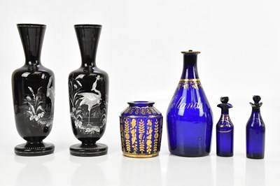 Lot 2377 - A pair of late 19th century enamel on black...