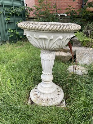 Lot 1228 - A marble birdbath, height 96cm, diameter 63cm.