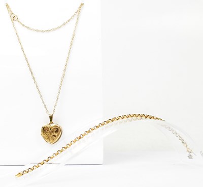 Lot 1483 - A 9ct yellow gold heart-shaped locket with...