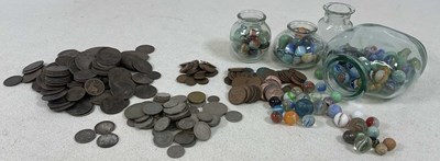 Lot 90 - Four jars of marbles with British and...